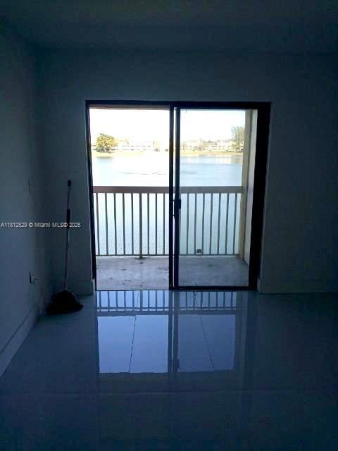 5200 NW 31st Ave Unit 14, Fort Lauderdale, FL 33309 - view of tiled empty room