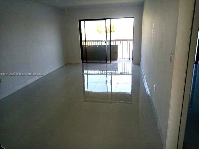 5200 NW 31st Ave Unit 14, Fort Lauderdale, FL 33309 - view of tiled empty room