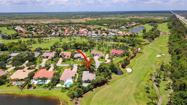 8244 Lakeview Dr, West Palm Beach, FL 33412 - aerial overview of property's location featuring a nearby body of water, nearby suburban area, and a local golf course