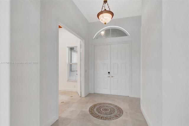 8244 Lakeview Dr, West Palm Beach, FL 33412 - entrance foyer with baseboards and light tile patterned floors