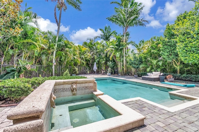 8244 Lakeview Dr, West Palm Beach, FL 33412 - view of pool featuring an in-ground hot tub, a fenced backyard, and a patio