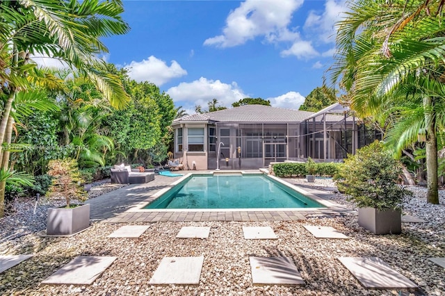 8244 Lakeview Dr, West Palm Beach, FL 33412 - outdoor pool featuring a lanai and a patio area