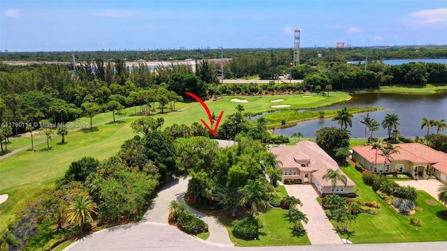 8244 Lakeview Dr, West Palm Beach, FL 33412 - bird's eye view of a tree filled landscape, a golf club, and a large body of water