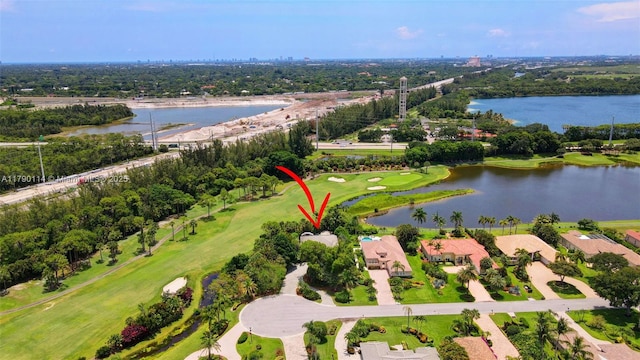 8244 Lakeview Dr, West Palm Beach, FL 33412 - bird's eye view of a tree filled landscape, a large body of water, and a golf course