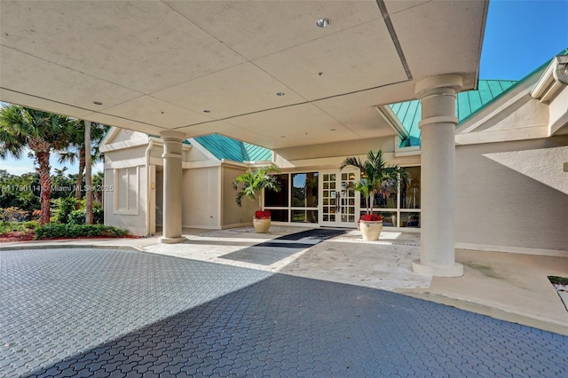 8244 Lakeview Dr, West Palm Beach, FL 33412 - view of patio / terrace featuring french doors