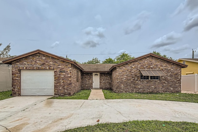 9353 SW 1st Pl, Boca Raton, FL 33428 - view of front of home with a garage, concrete driveway, and brick siding
