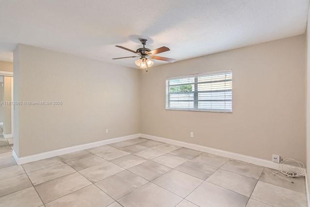 9353 SW 1st Pl, Boca Raton, FL 33428 - empty room featuring ceiling fan, light tile patterned floors, and baseboards