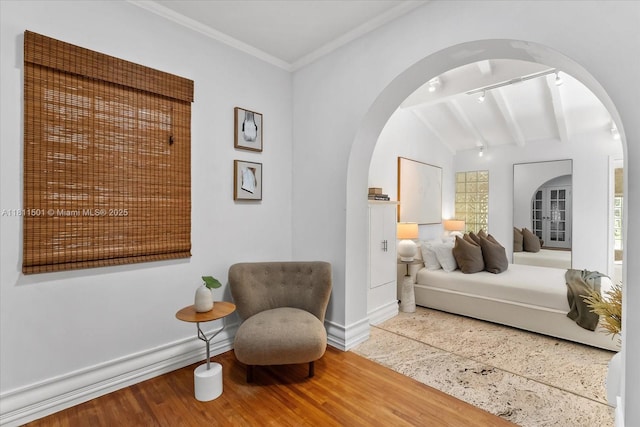 8538 NE 4th Ave, El Portal, FL 33138 - bedroom with arched walkways, baseboards, and ornamental molding