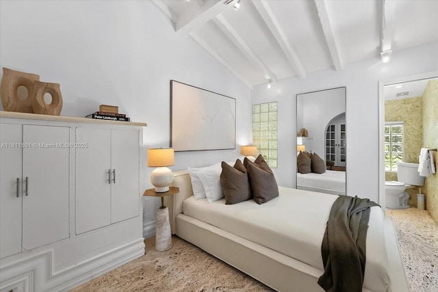 8538 NE 4th Ave, El Portal, FL 33138 - bedroom with connected bathroom and track lighting