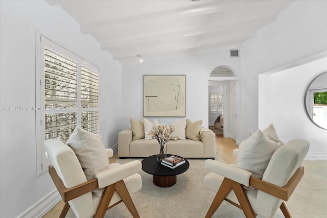 8538 NE 4th Ave, El Portal, FL 33138 - living area with arched walkways and baseboards