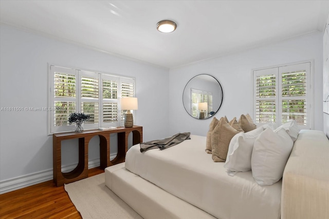 8538 NE 4th Ave, El Portal, FL 33138 - bedroom with wood finished floors and multiple windows