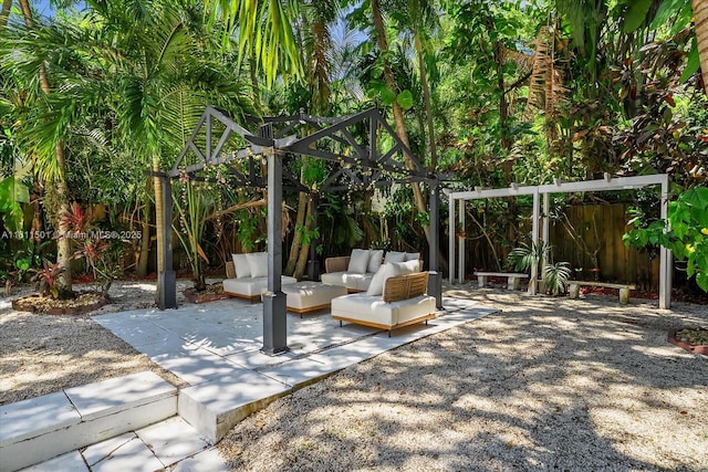 8538 NE 4th Ave, El Portal, FL 33138 - fenced backyard featuring a patio and an outdoor living space