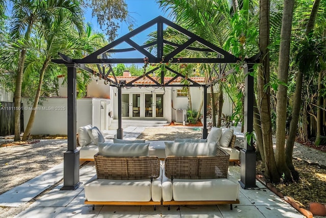 8538 NE 4th Ave, El Portal, FL 33138 - view of patio with outdoor lounge area and french doors