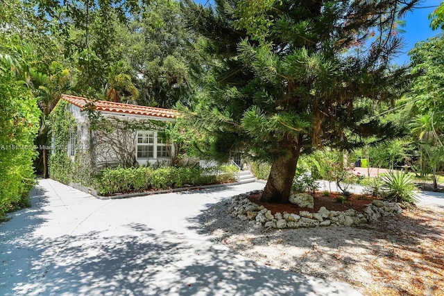 8538 NE 4th Ave, El Portal, FL 33138 - view of front facade with a tile roof