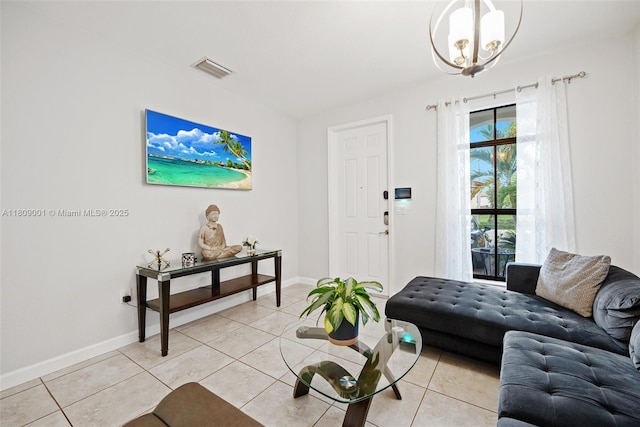 23900 SW 118th Ave, Homestead, FL 33032 - living area with a chandelier, light tile patterned floors, and baseboards