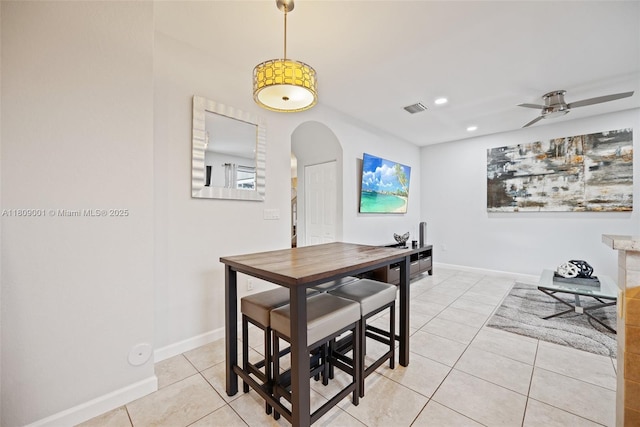 23900 SW 118th Ave, Homestead, FL 33032 - dining area with arched walkways, light tile patterned floors, a ceiling fan, recessed lighting, and baseboards