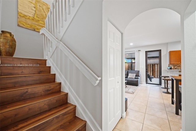 23900 SW 118th Ave, Homestead, FL 33032 - staircase featuring arched walkways and tile patterned flooring