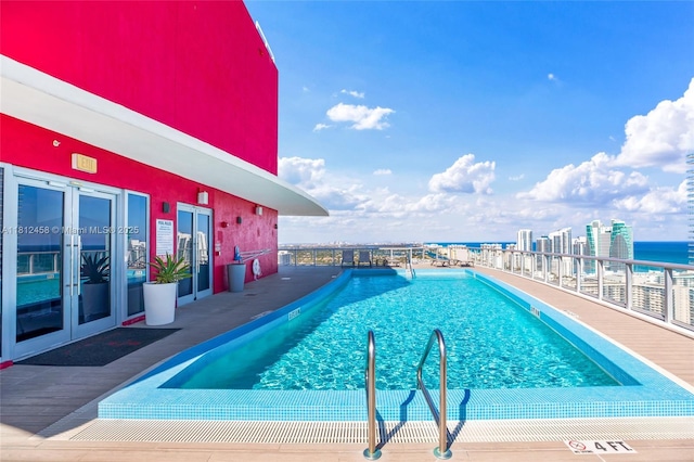 2602 E Hallandale Beach Blvd Unit R1709, Hallandale Beach, FL 33009 - community pool featuring french doors and a water view