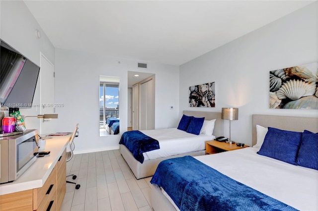 2602 E Hallandale Beach Blvd Unit R1709, Hallandale Beach, FL 33009 - bedroom featuring baseboards