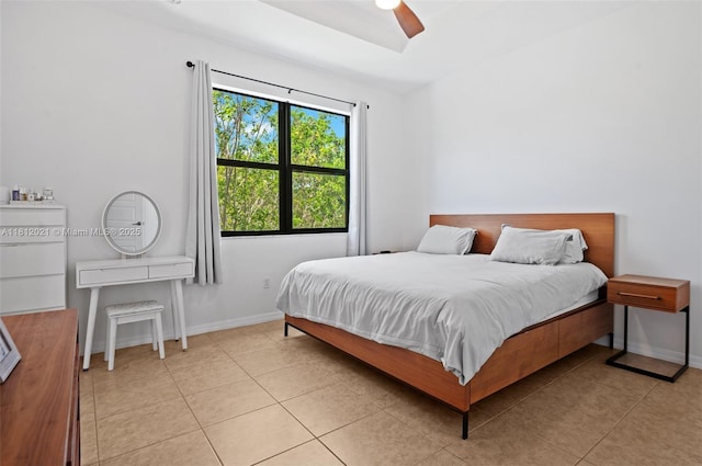 659 NE 191st St, Miami, FL 33179 - bedroom featuring baseboards, light tile patterned floors, and ceiling fan