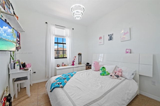 659 NE 191st St, Miami, FL 33179 - bedroom featuring light tile patterned flooring, a chandelier, and baseboards