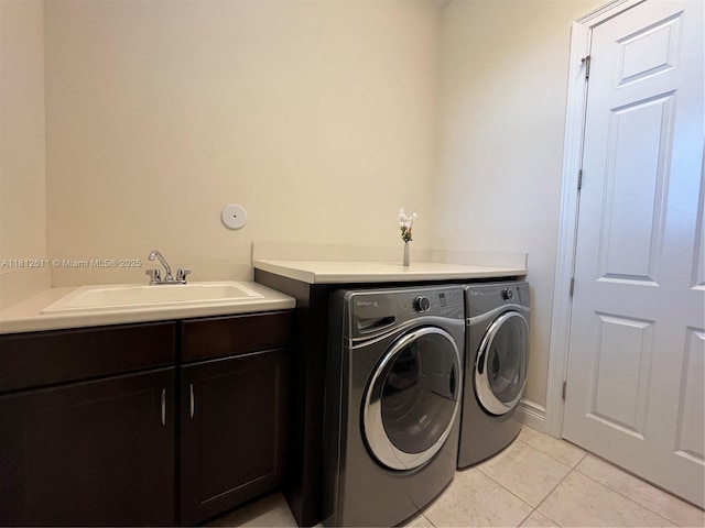 8248 Lost Creek Ln, Delray Beach, FL 33446 - laundry area with washer and dryer, a sink, and light tile patterned flooring