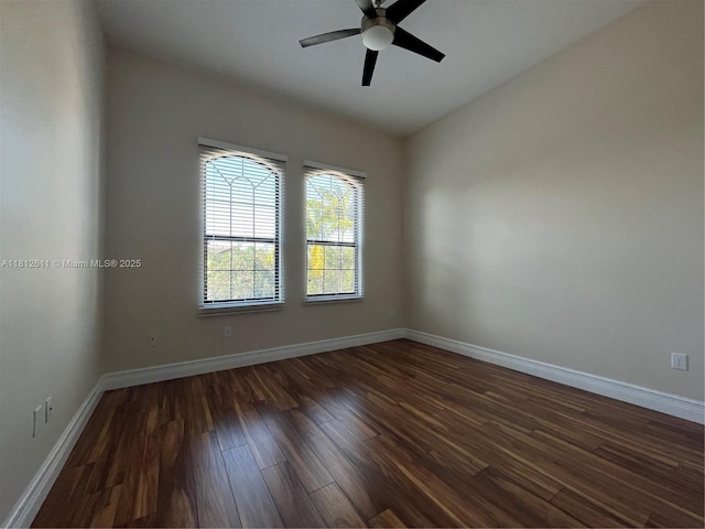 8248 Lost Creek Ln, Delray Beach, FL 33446 - spare room featuring dark wood-type flooring, a ceiling fan, and baseboards