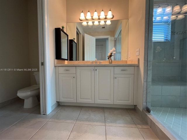 8248 Lost Creek Ln, Delray Beach, FL 33446 - bathroom featuring vanity, toilet, a tile shower, and tile patterned floors