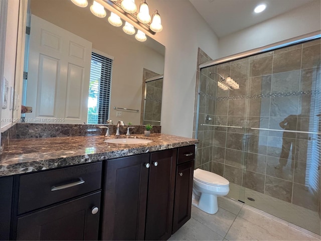8248 Lost Creek Ln, Delray Beach, FL 33446 - bathroom featuring vanity, tile patterned flooring, toilet, and a shower stall