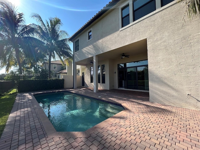 8248 Lost Creek Ln, Delray Beach, FL 33446 - view of swimming pool featuring a ceiling fan and a patio area