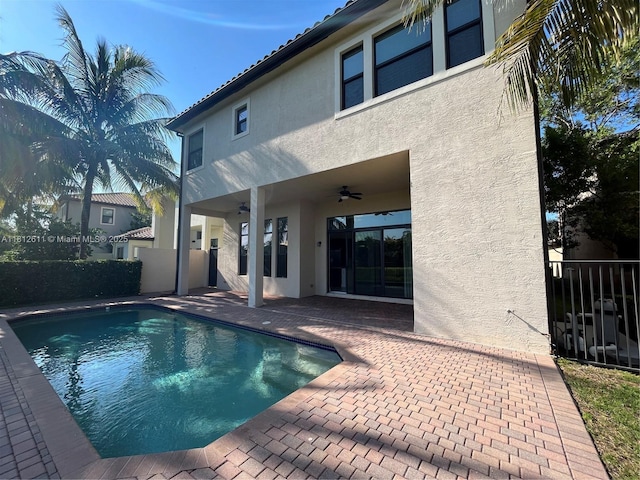 8248 Lost Creek Ln, Delray Beach, FL 33446 - view of swimming pool with a ceiling fan and a patio area