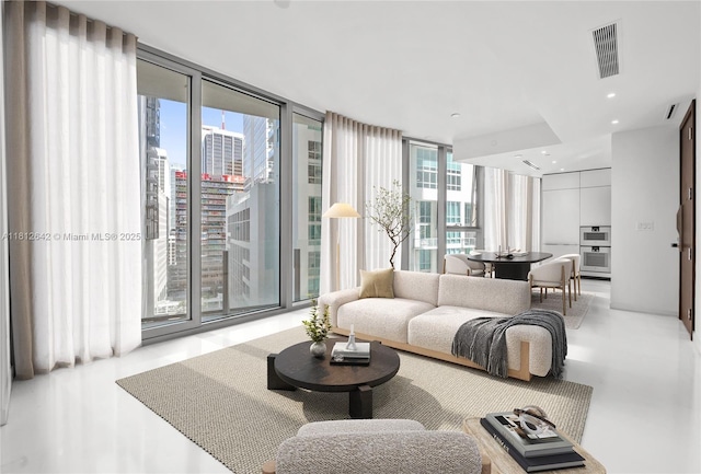 300 Biscayne Boulevard Way Unit 1106W, Miami, FL 33131 - living area featuring a wall of windows and recessed lighting