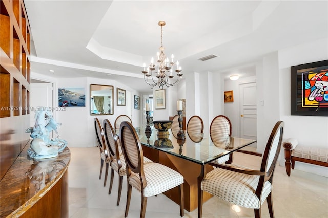 19955 NE 38th Ct Unit 2204, Aventura, FL 33180 - dining space featuring a chandelier, a raised ceiling, and light tile patterned floors