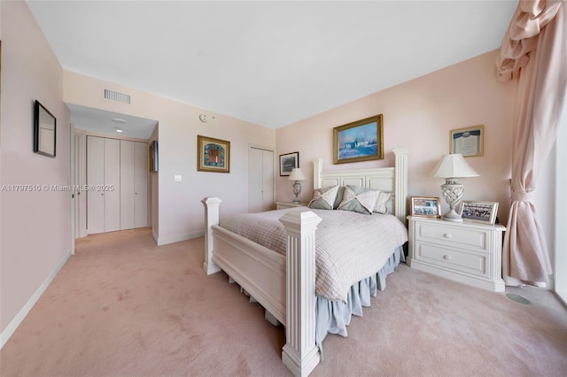 19955 NE 38th Ct Unit 2204, Aventura, FL 33180 - bedroom with light colored carpet, baseboards, and a closet