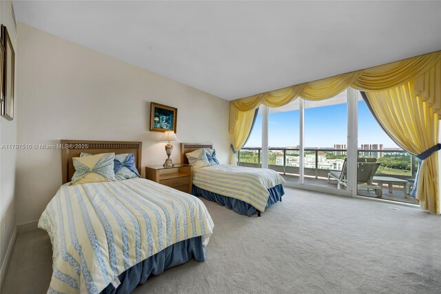 19955 NE 38th Ct Unit 2204, Aventura, FL 33180 - carpeted bedroom featuring access to exterior and expansive windows