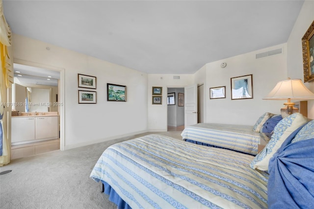 19955 NE 38th Ct Unit 2204, Aventura, FL 33180 - bedroom with light colored carpet, ensuite bathroom, and a sink