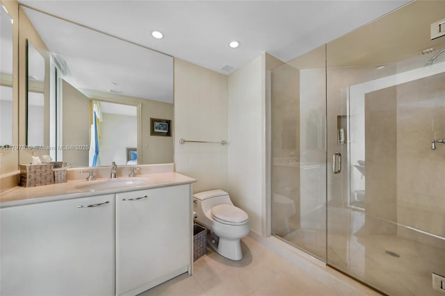 19955 NE 38th Ct Unit 2204, Aventura, FL 33180 - bathroom featuring toilet, vanity, a shower stall, and tile patterned flooring