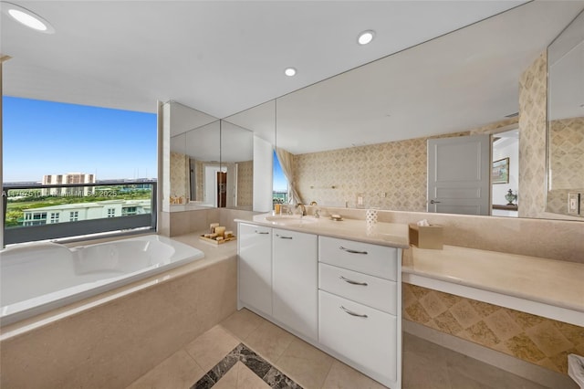 19955 NE 38th Ct Unit 2204, Aventura, FL 33180 - full bathroom featuring tile patterned floors, vanity, a bath, inlaid floor details, and recessed lighting