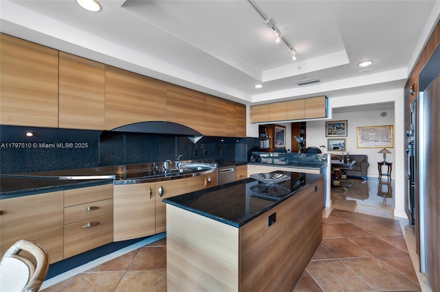 19955 NE 38th Ct Unit 2204, Aventura, FL 33180 - kitchen featuring a tray ceiling, dark tile patterned flooring, backsplash, light brown cabinets, and recessed lighting