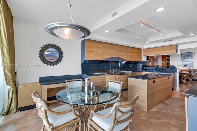 19955 NE 38th Ct Unit 2204, Aventura, FL 33180 - dining space featuring a tray ceiling, recessed lighting, and light tile patterned flooring