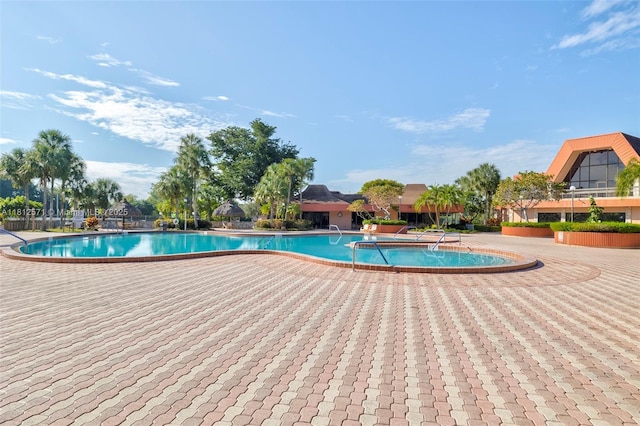 3170 Holiday Springs Blvd Unit 6-209, Margate, FL 33063 - community pool with a patio area
