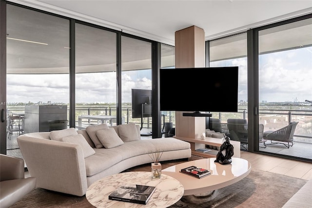 8701 Collins Ave Unit 905, Miami Beach, FL 33154 - living room with floor to ceiling windows, plenty of natural light, and wood finished floors