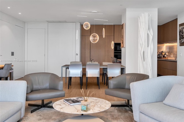 8701 Collins Ave Unit 905, Miami Beach, FL 33154 - living room with attic access, light wood-style floors, and recessed lighting