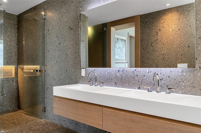 8701 Collins Ave Unit 905, Miami Beach, FL 33154 - bathroom with a walk in shower, double vanity, and recessed lighting