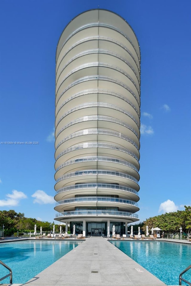 8701 Collins Ave Unit 905, Miami Beach, FL 33154 - community pool with a patio area