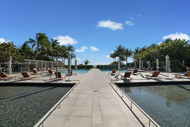 8701 Collins Ave Unit 905, Miami Beach, FL 33154 - community pool with a patio