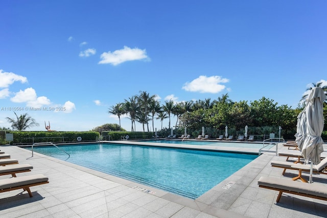 8701 Collins Ave Unit 905, Miami Beach, FL 33154 - community pool with a patio