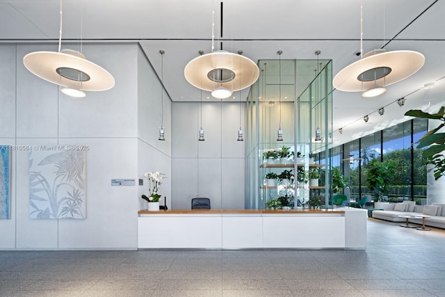 8701 Collins Ave Unit 905, Miami Beach, FL 33154 - reception area featuring a high ceiling and expansive windows