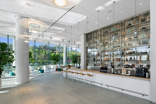 8701 Collins Ave Unit 905, Miami Beach, FL 33154 - view of community with a bar and expansive windows