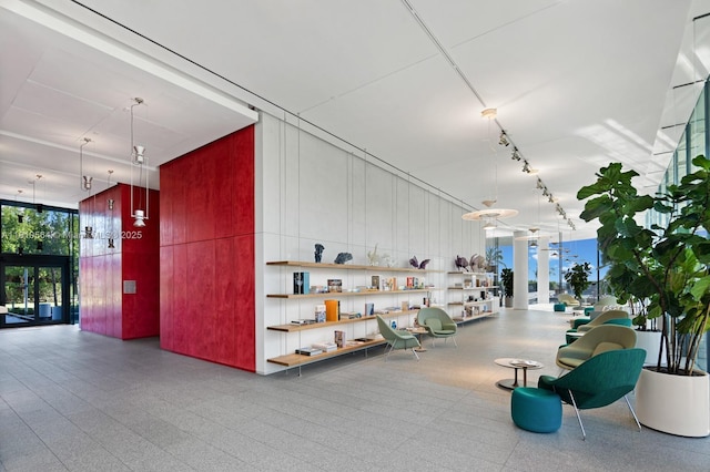 8701 Collins Ave Unit 905, Miami Beach, FL 33154 - community lobby with a wall of windows
